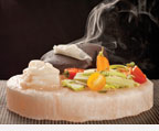 sea bass and vegetable salad on Himalayan sea salt