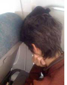 Sleeping in an airplane seat